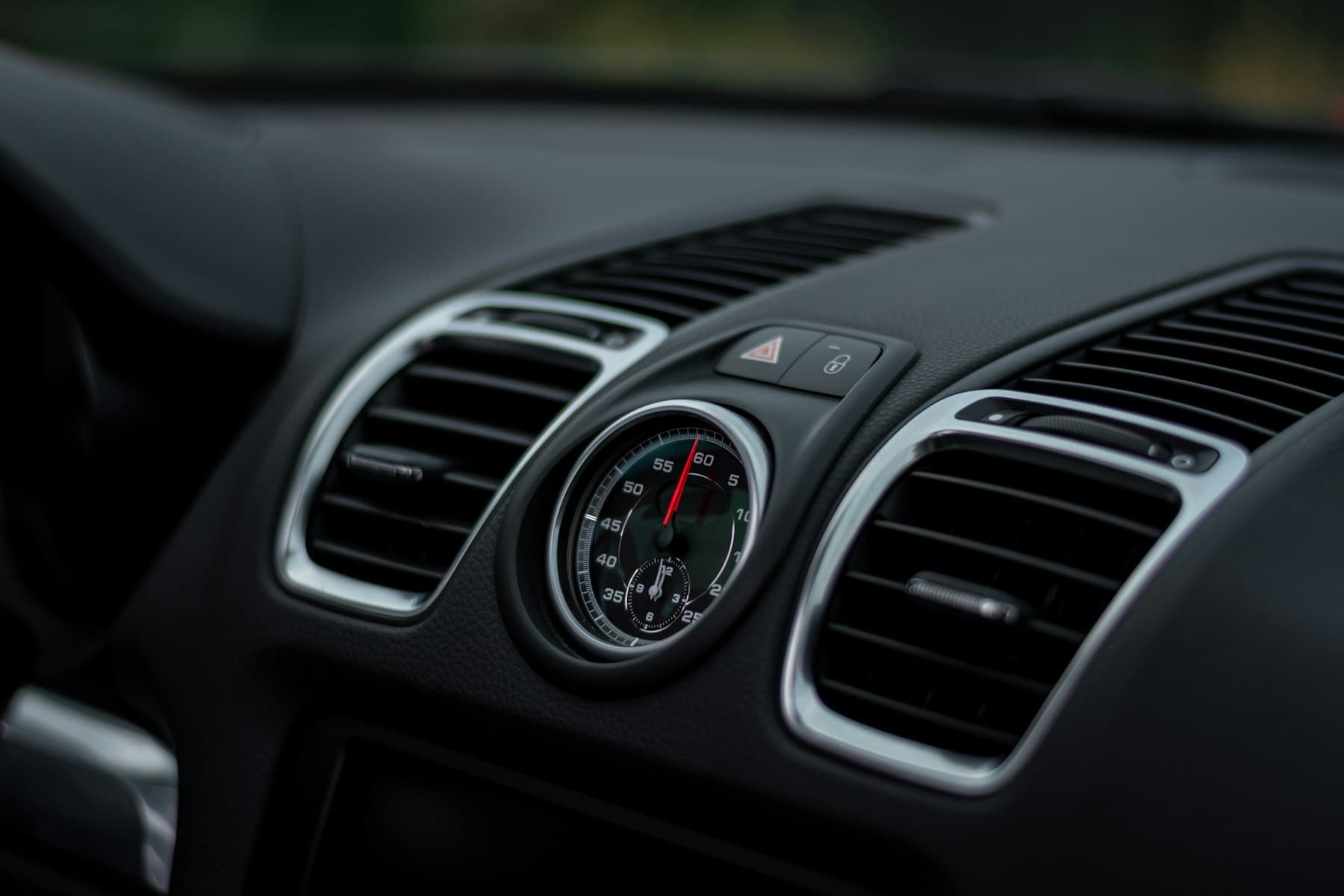 Clean car dashboard and air vent detail after a mobile interior clean in Saint John