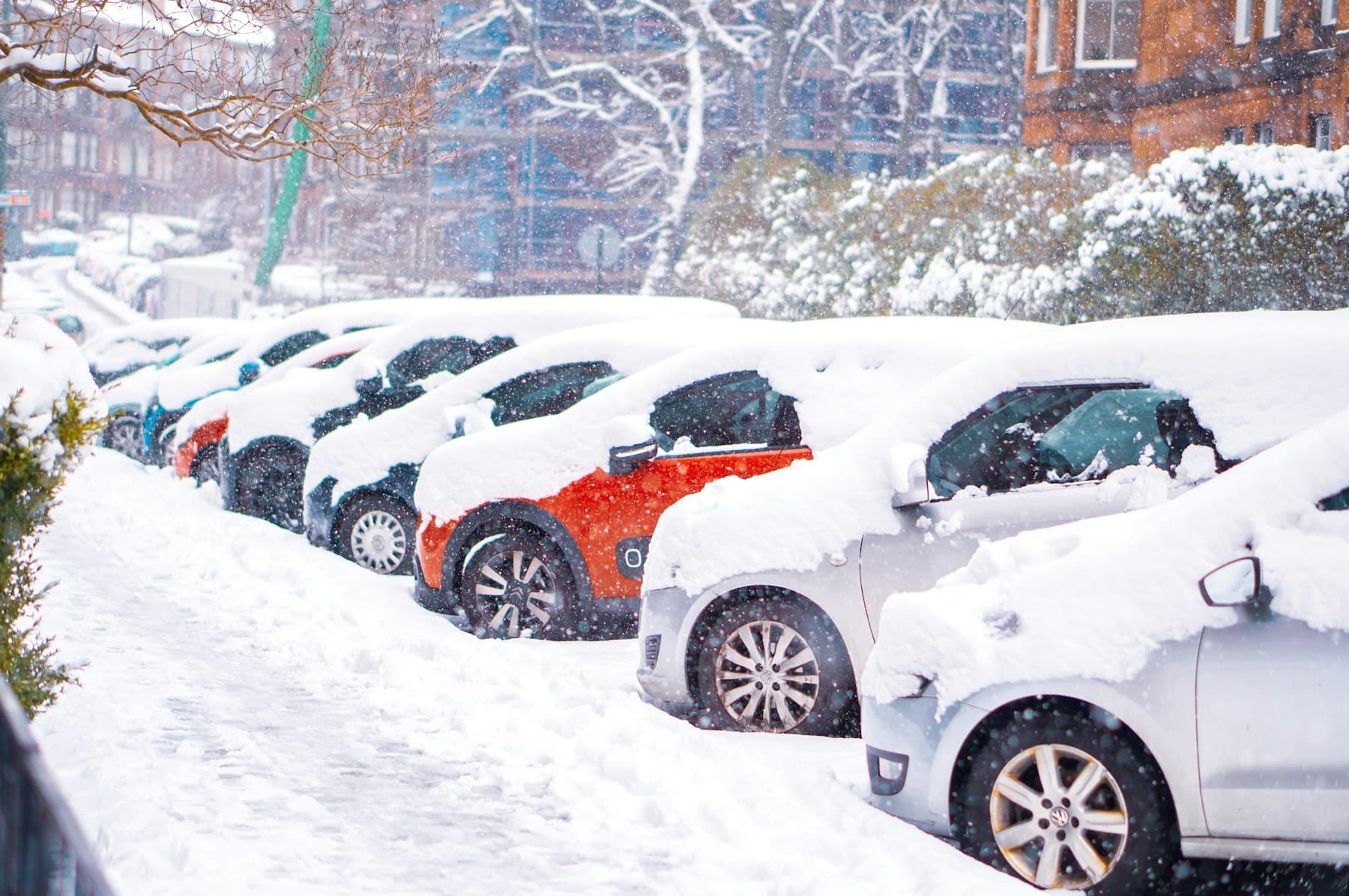 Vehicle covered in snow during a New Brunswick winter, before salt removal by A1 Car Cleaning